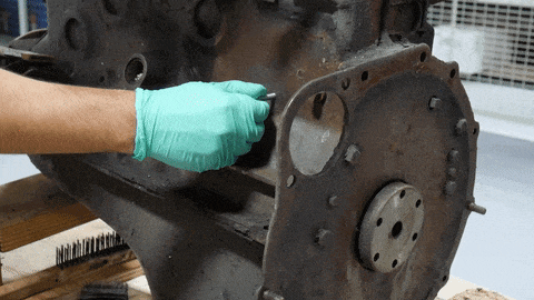 Cracked engine block repair: insert studs