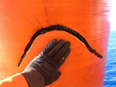 A tear in the rubber of an offloading hose needed emergency repair