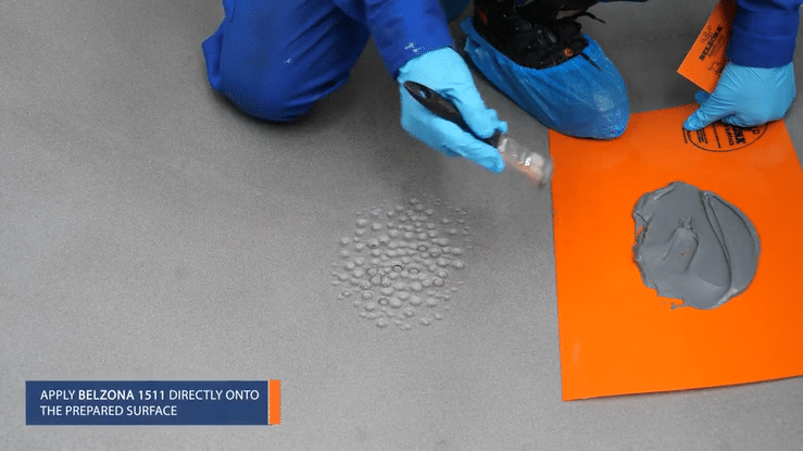 Repairing pitting corrosion on a vessel using Belzona repair epoxy and a short bristled brush