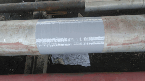 Application of a pipeline coating completed with a Belzona solution