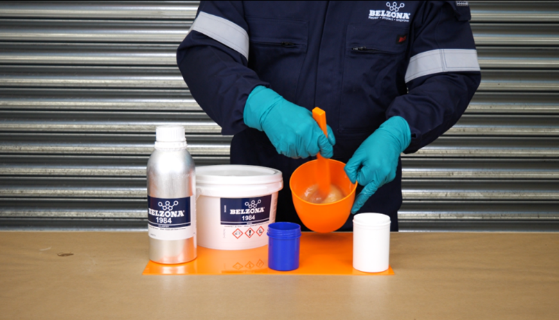 Mixing the Belzona 1984 resin prior to incorporating with the Belzona 9381 fabric