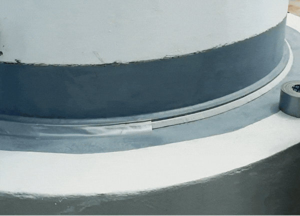 Apply bridging tape across the tank base joint