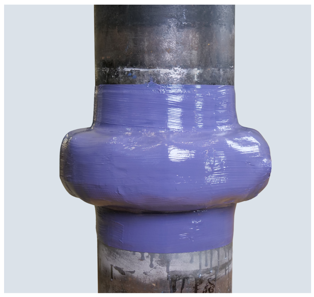 Applying a second coat of Belzona 7311 to the flange