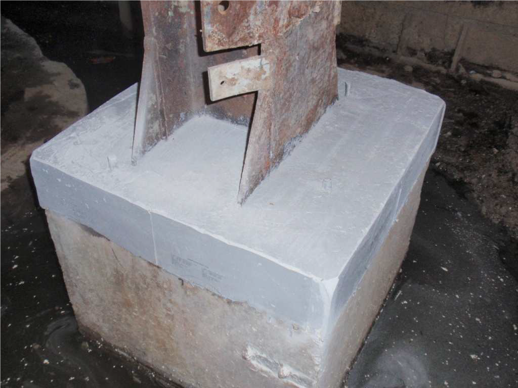 Epoxy concrete repair system restores concrete foundation under machinery in a paper mill