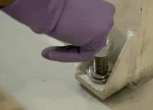 Tighten the nuts and bolts to complete the anchor bolt installation