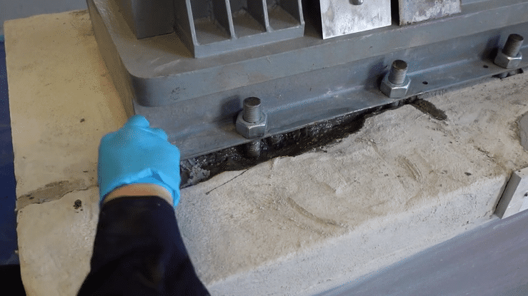 Belzona 4111 (Magma-Quartz) being used to fill a void to restore equipment alignment